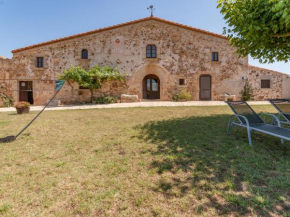 Catalan farmhouse with round pool in the middle of forest